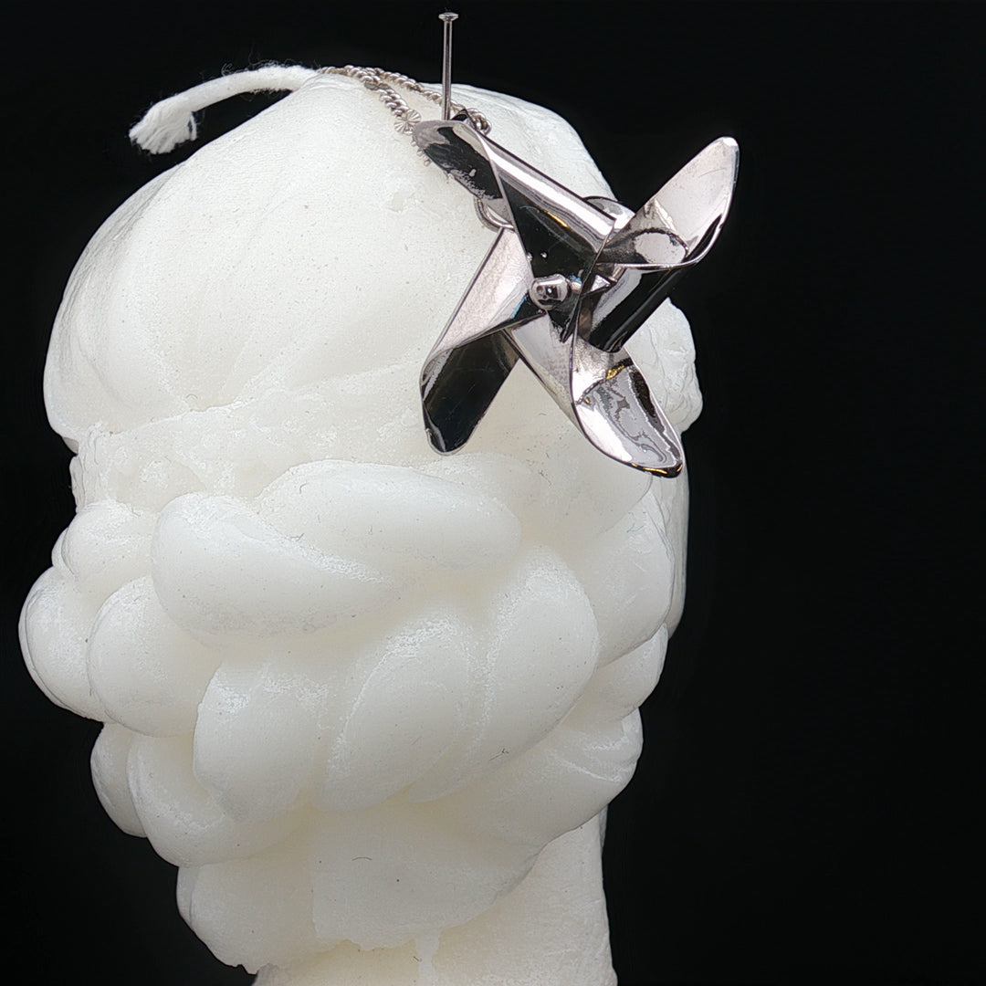 Whirling Memories – The Spinning Top Pendant