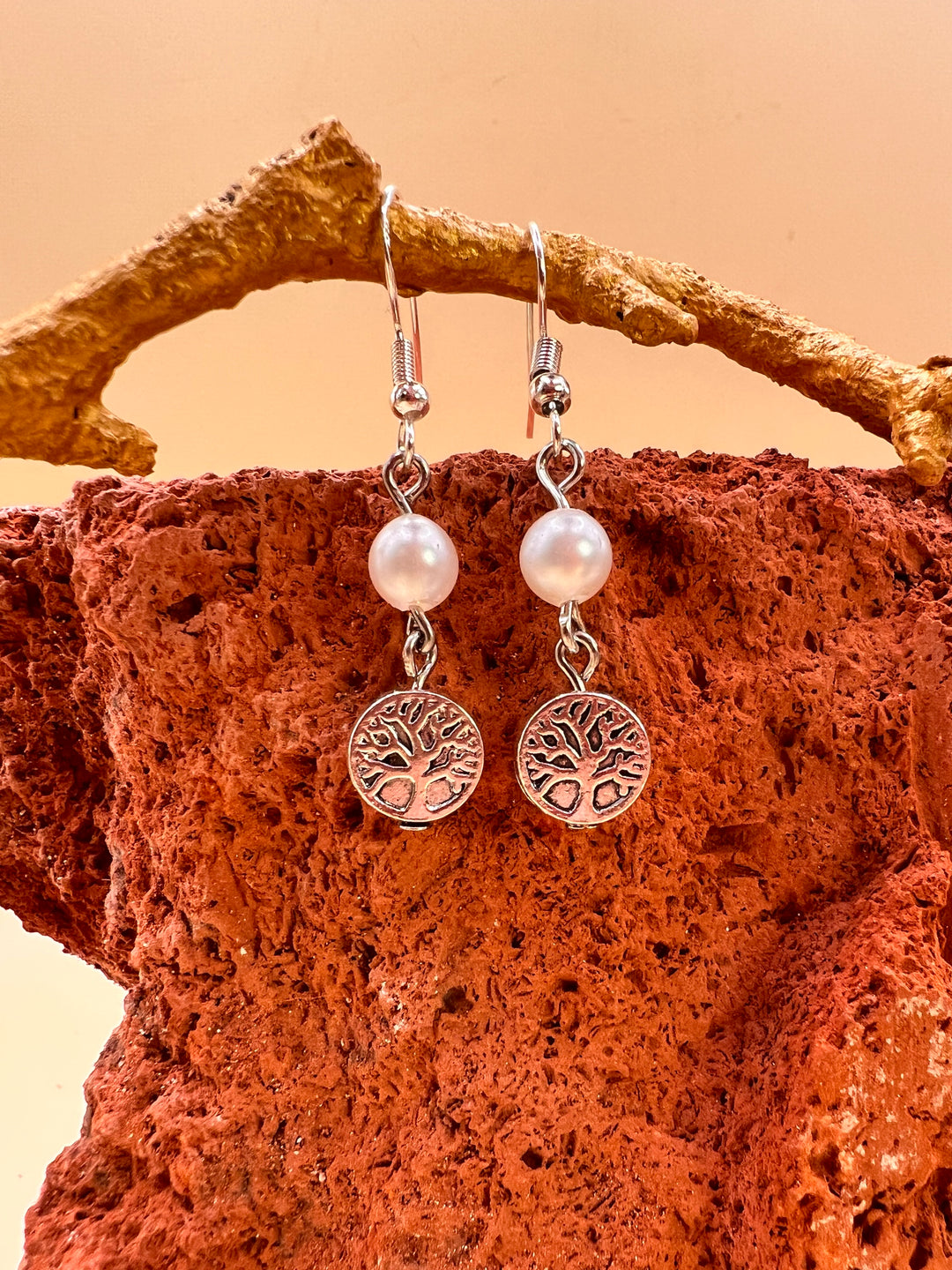 Tree of Life Pearl Earrings 
A small tree that reminds us where we come from and how we continue to grow.