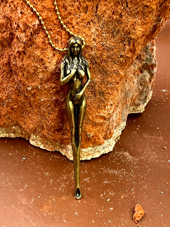 “Sacred Within” – Bronze Feminine Energy Sculpture Necklace She stands unguarded, yet unbroken —
her softness is her greatest strength.