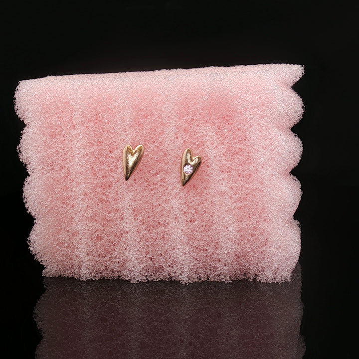 Held by the Heart Studs by Seen by Queen
Handcrafted 14K Gold Heart Earrings with Sapphire