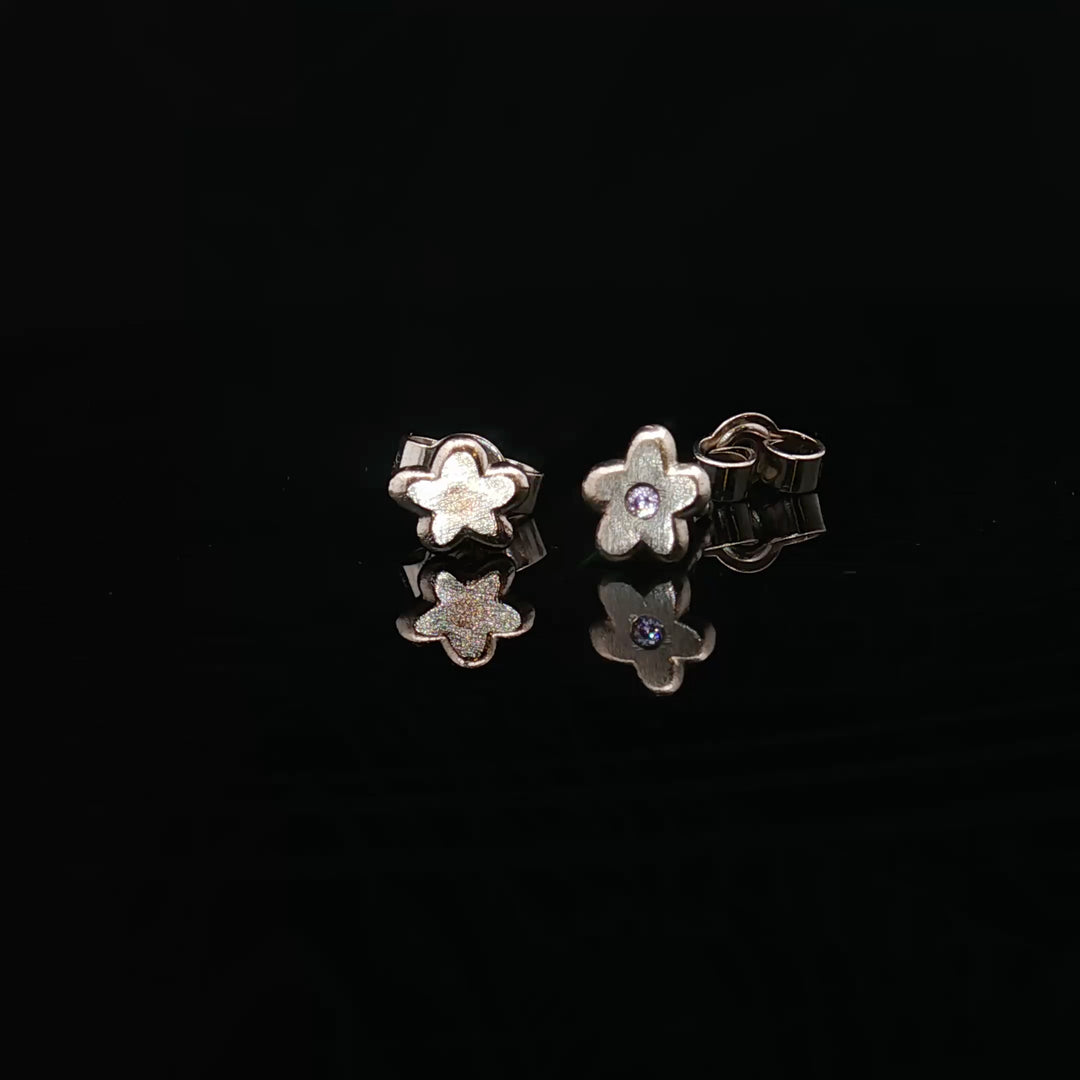 Silent Bloom Studs by Seen by Queen
Handcrafted 14K Gold Flower Earrings with Sapphire Spark