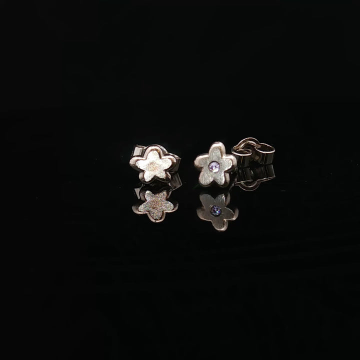 Silent Bloom Studs by Seen by Queen
Handcrafted 14K Gold Flower Earrings with Sapphire Spark