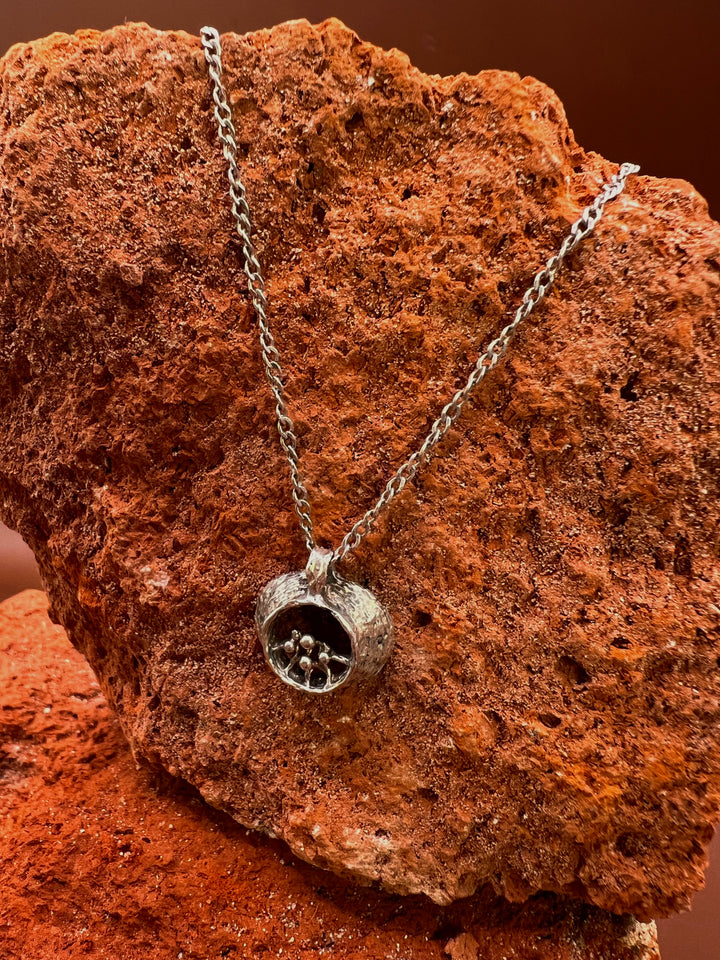 Nordic Seed – Vintage Silver Pendant A small vessel of silver — holding the quiet strength of the North