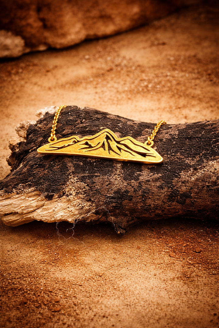 Summit Within – Gold Mountain Silhouette Necklace She wears the mountain —
because she knows how to rise.
