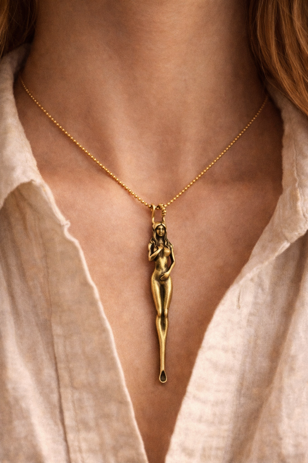 “Sacred Within” – Bronze Feminine Energy Sculpture Necklace She stands unguarded, yet unbroken —
her softness is her greatest strength.