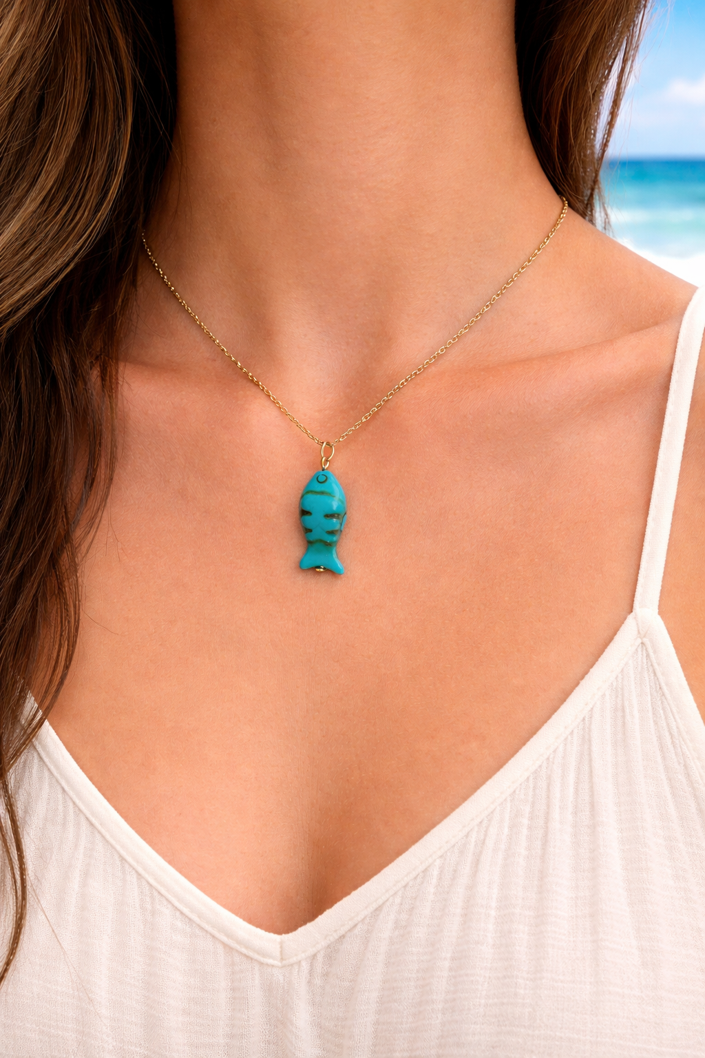 Azure Tide Fish Necklace A small fish, a vast ocean —
a reminder that even the smallest soul carries the depth of the sea.