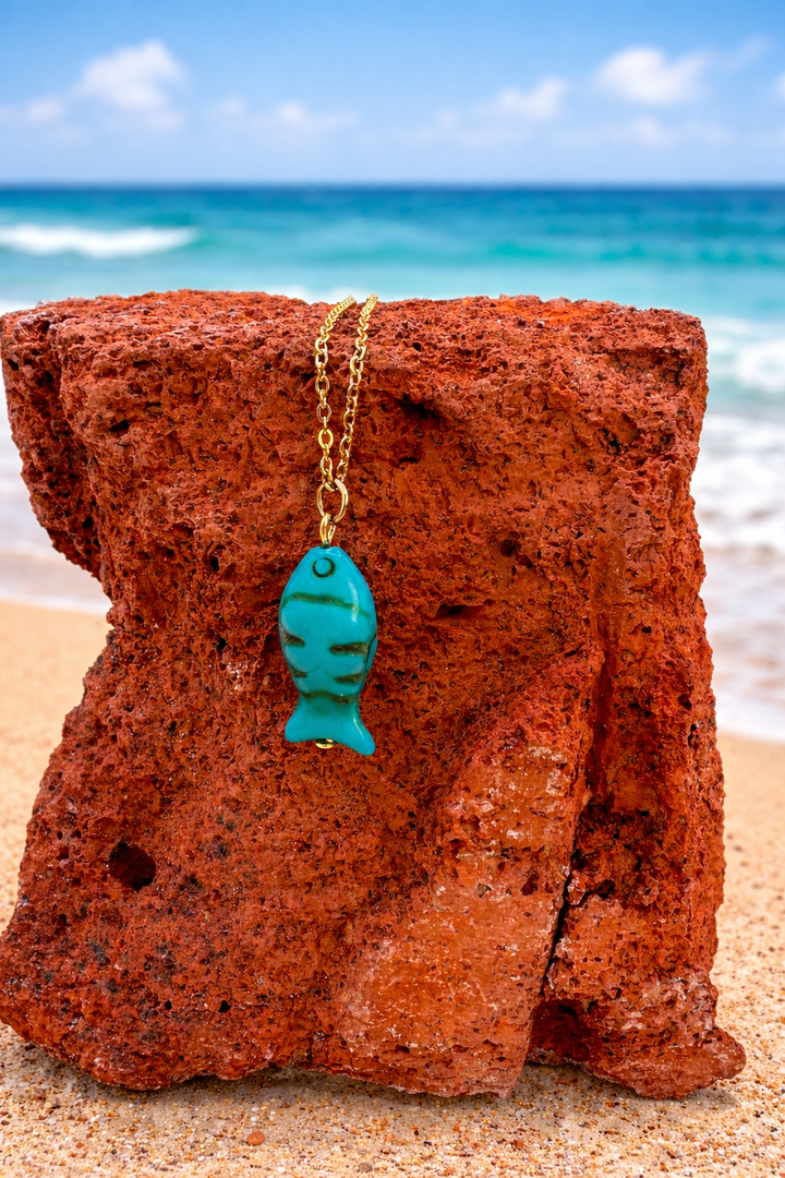 Azure Tide Fish Necklace A small fish, a vast ocean —
a reminder that even the smallest soul carries the depth of the sea.