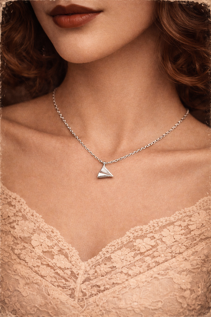 Nostalgia – Origami Paper Plane Necklace 925 silver
Folded from memory, flying toward your dreams.