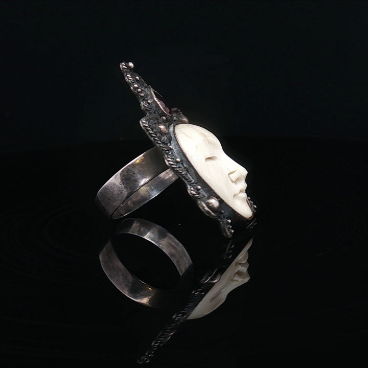 The silnet witness Bone carved face oxidised  silver ring