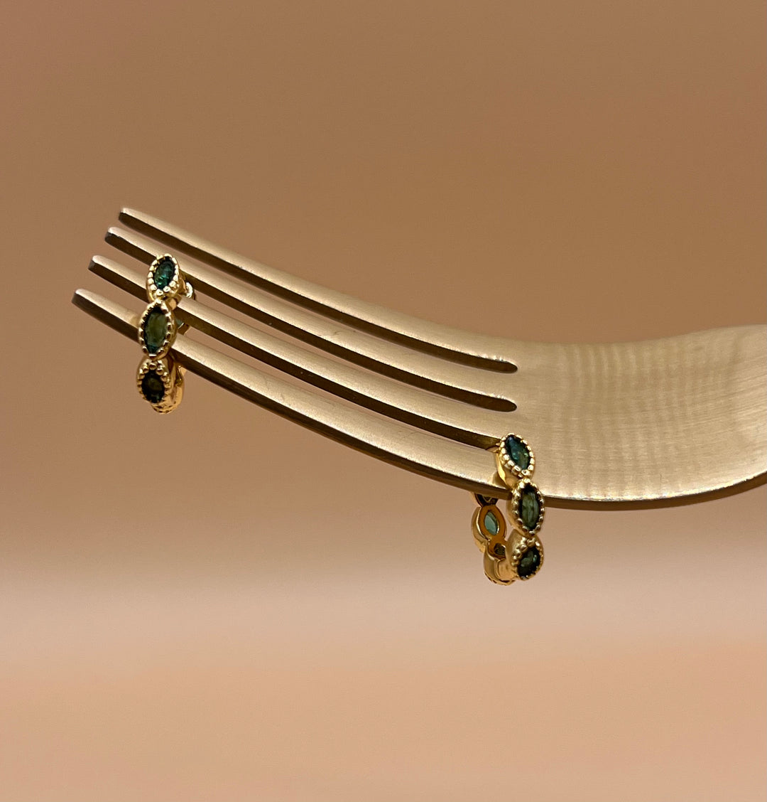 A pair of petite green zirconia hoop earrings 15 mm outside