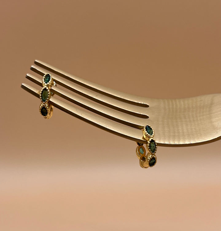 A pair of petite green zirconia hoop earrings 15 mm outside