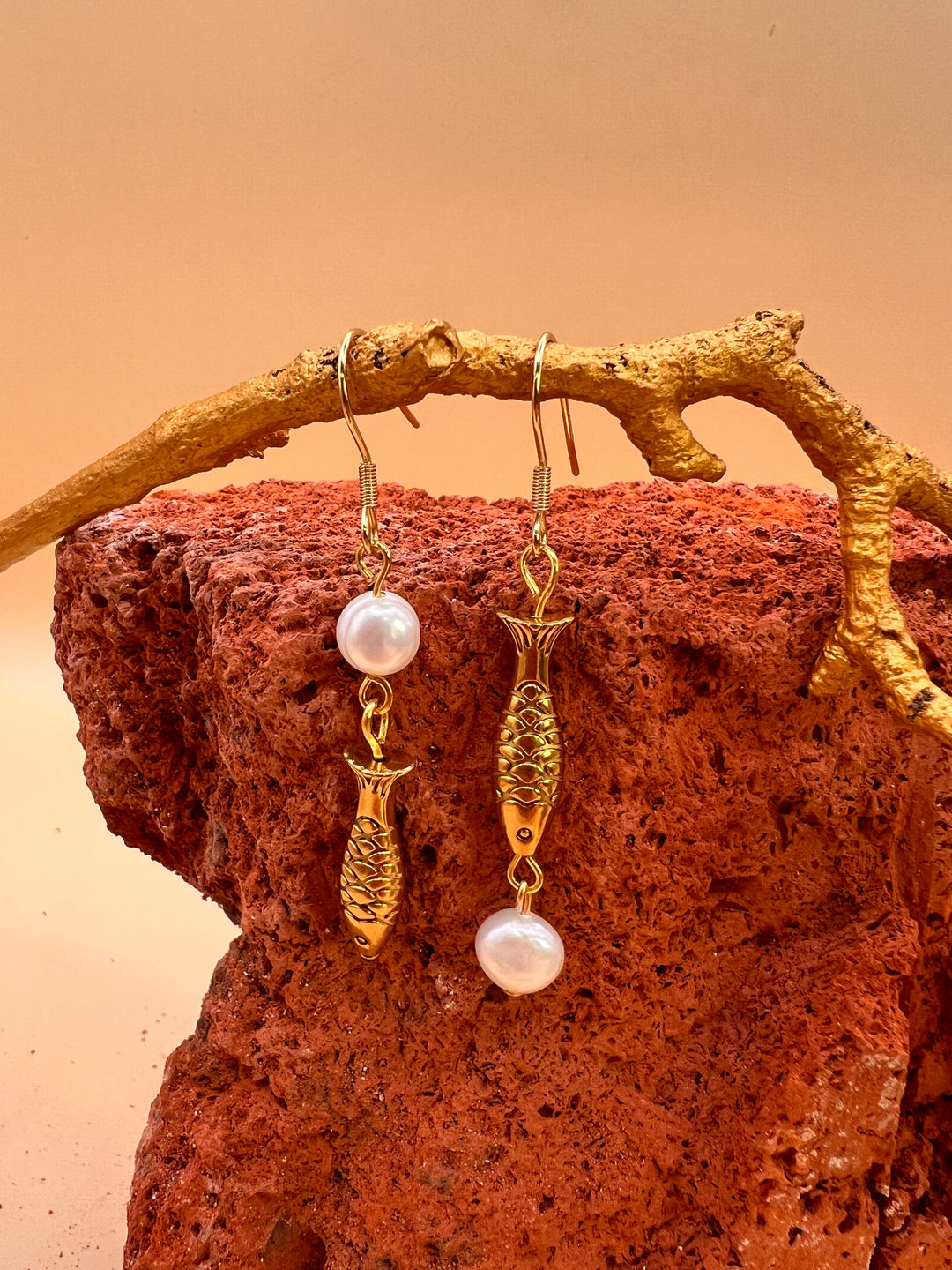 Nordic Ocean Fish Pearl Earrings From the quiet depths of the sea, a small fish carries the story of the ocean.