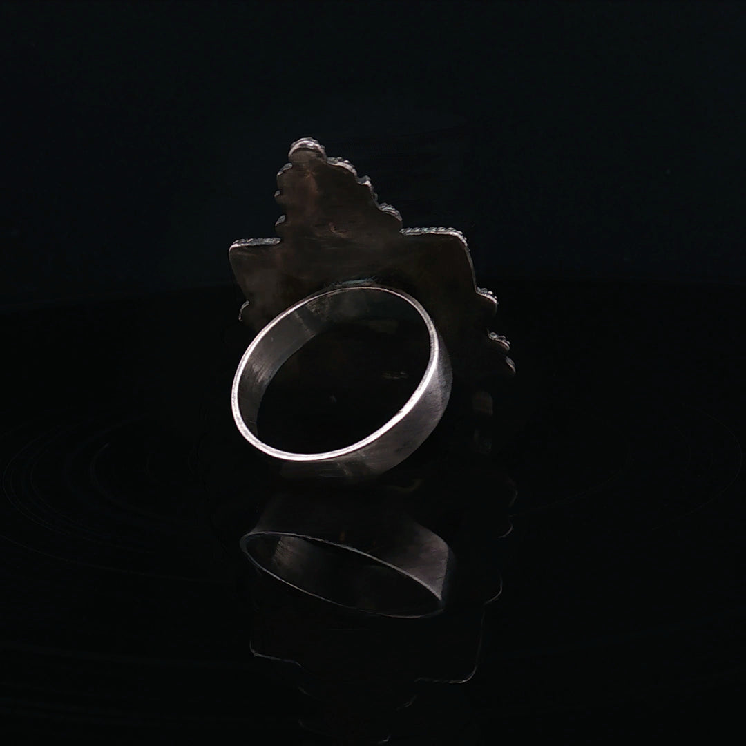 The silnet witness Bone carved face oxidised  silver ring