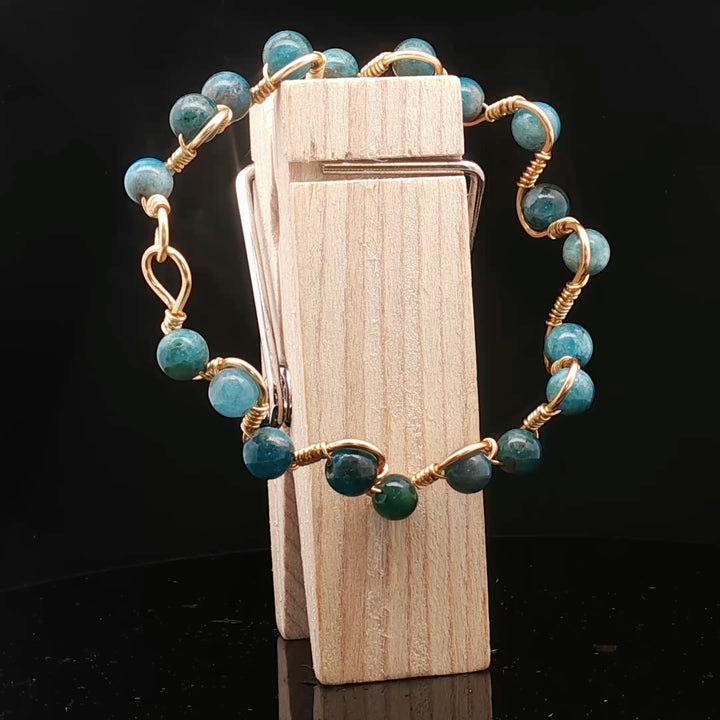 Ocean of Peace – Apatite Wire-Wrapped Bracelet
Where calm thoughts flow, and truth finds its voice.