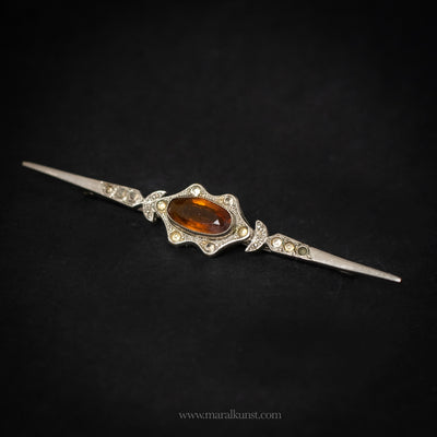 Silver Brooch with Amber Radiance