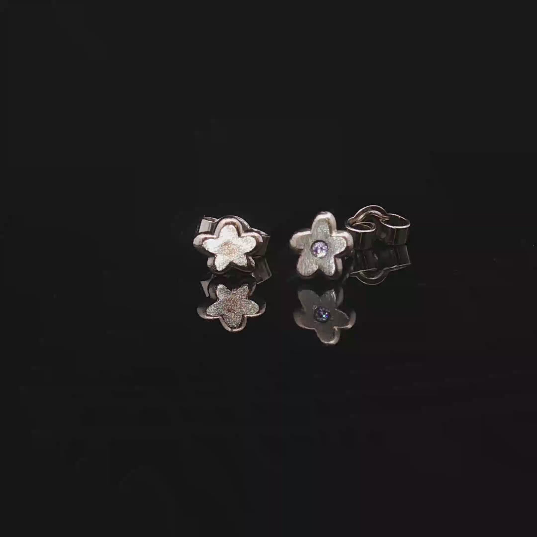 Silent Bloom Studs by Seen by Queen
Handcrafted 14K Gold Flower Earrings with Sapphire Spark