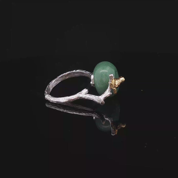 Whispers of Jade – Handmade Silver Ring with Bird & Branch