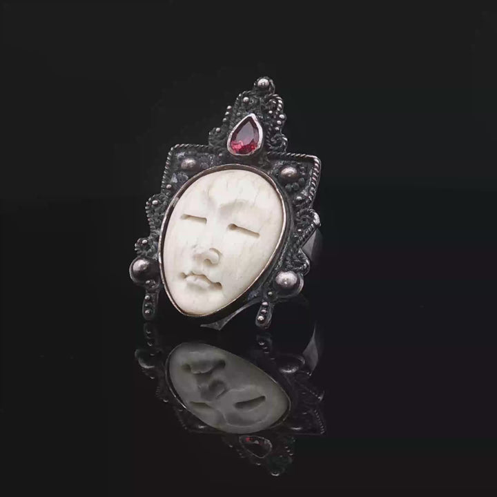 The silnet witness Bone carved face oxidised  silver ring