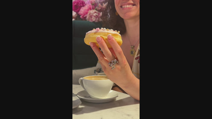 a women wears a Mexican ring in sterling silver 
