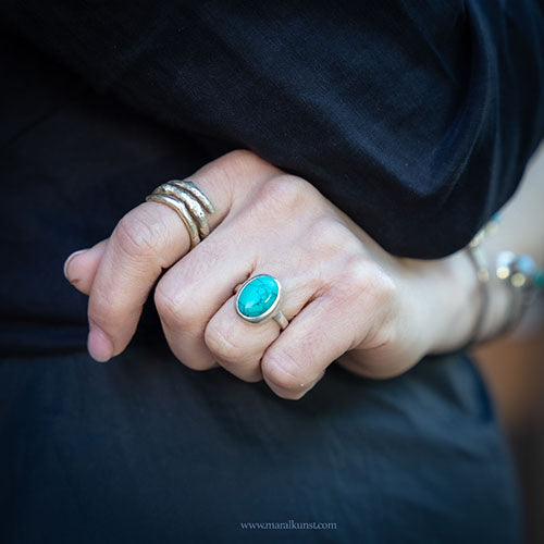 a women wears a Mexican ring in sterling silver 