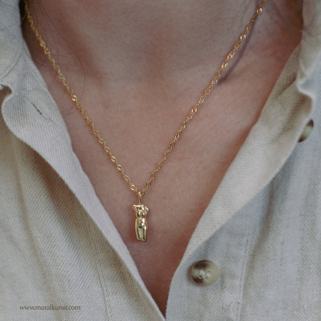Maral Woman body goldplated steel necklace