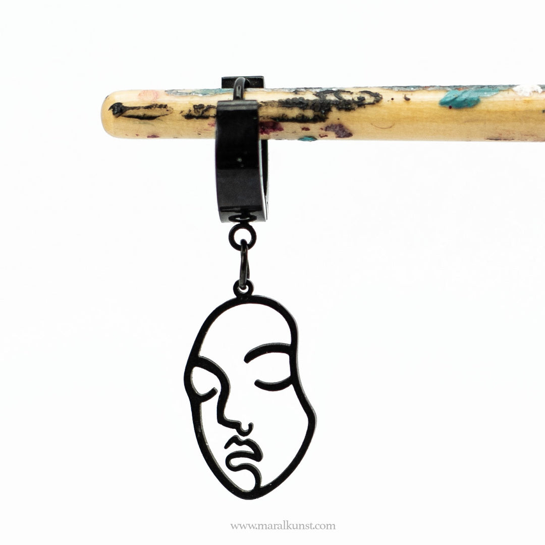 Abstract face designer black hoop earring one ear
