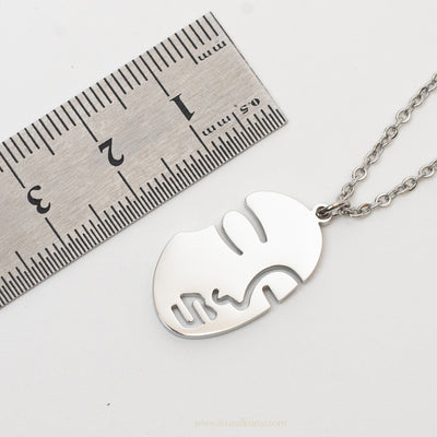 Stainless steel face necklace