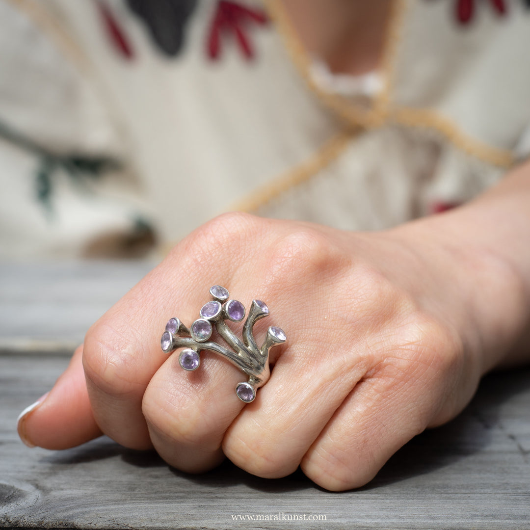 a women wears a Mexican ring in sterling silver 