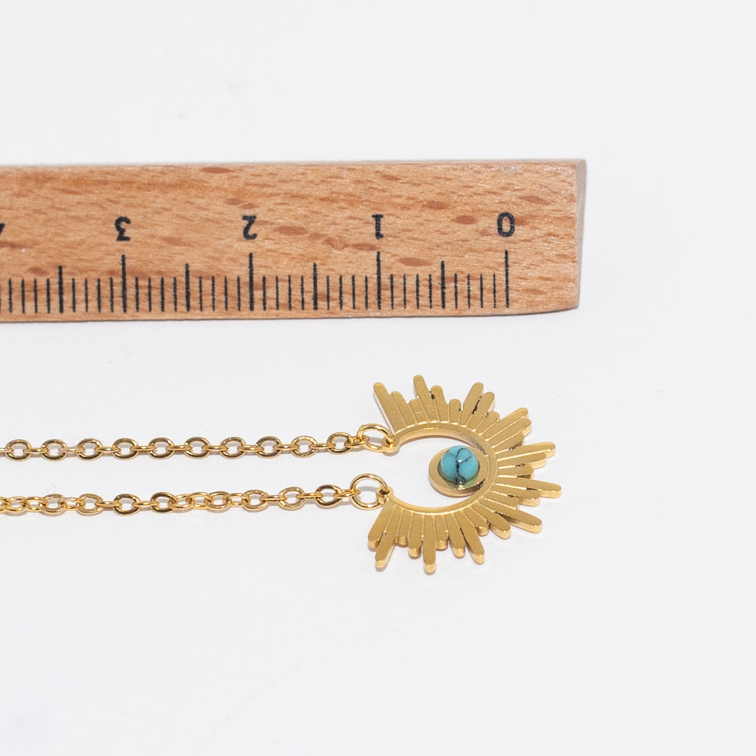 The Sun with turquoise necklace