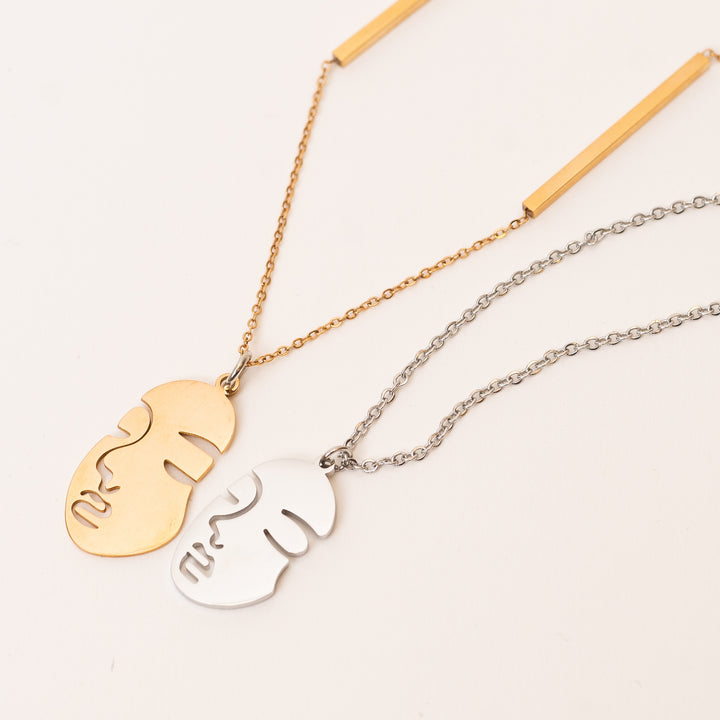 Rose gold face necklace
