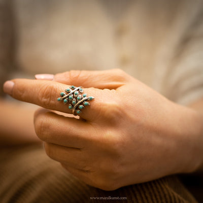 a women wears a Mexican ring in sterling silver 