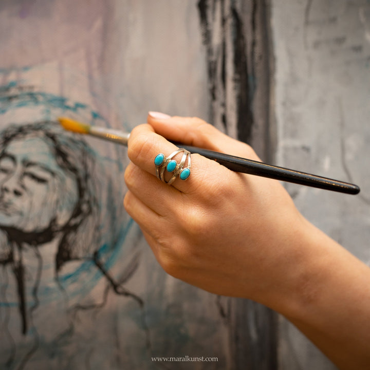 a women wears a Mexican ring in sterling silver 