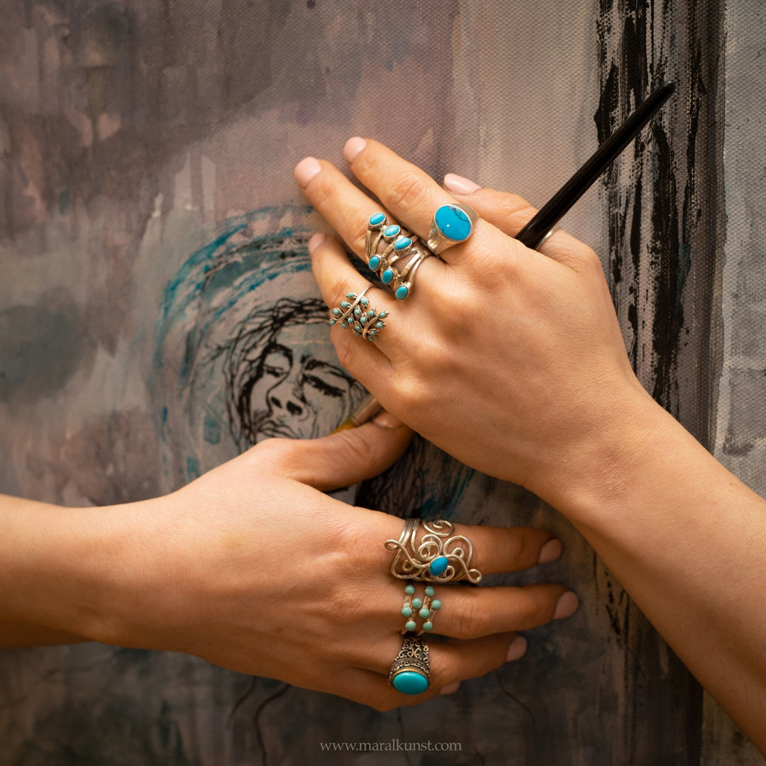 a women wears a Mexican ring in sterling silver 